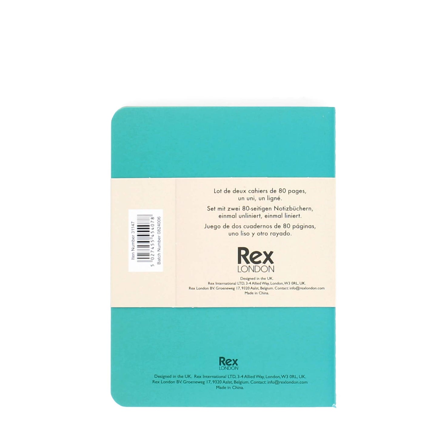 Teal notebook with beige label on a white background