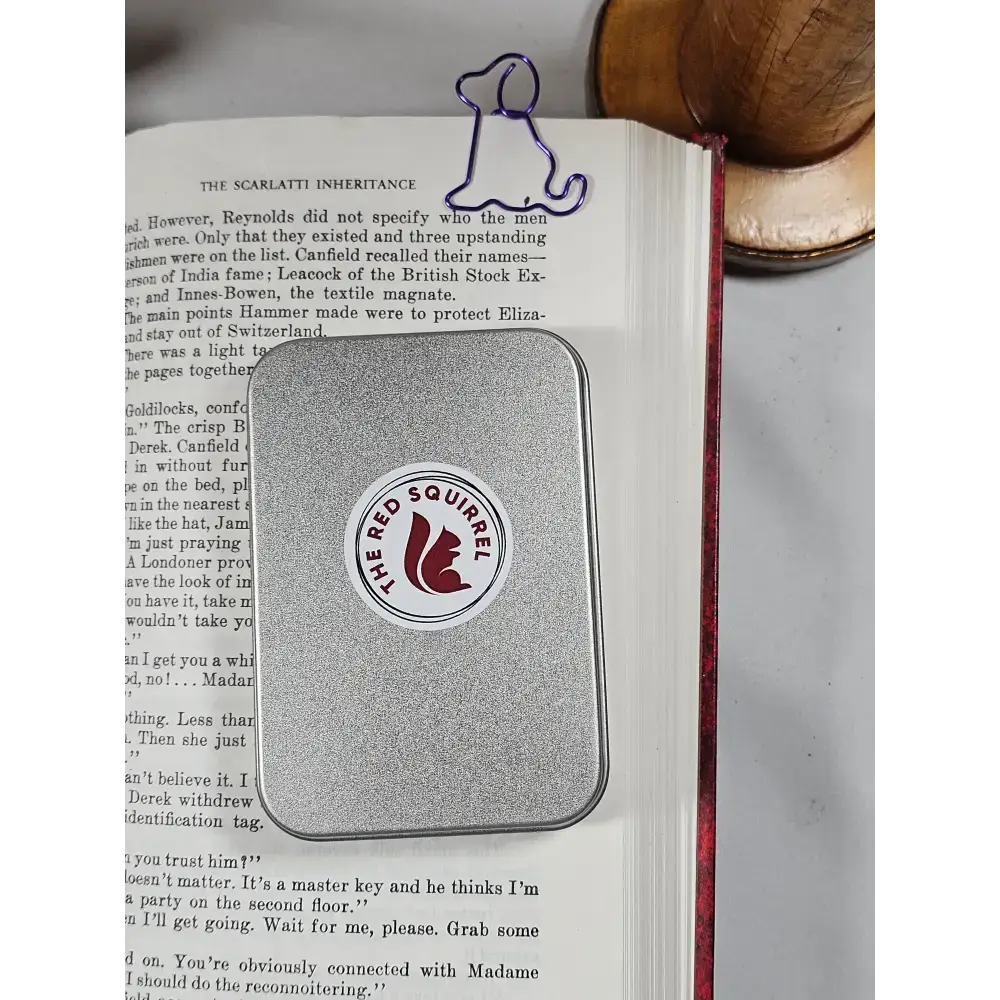 20 Dog Paper clips in a tin. - paper clips