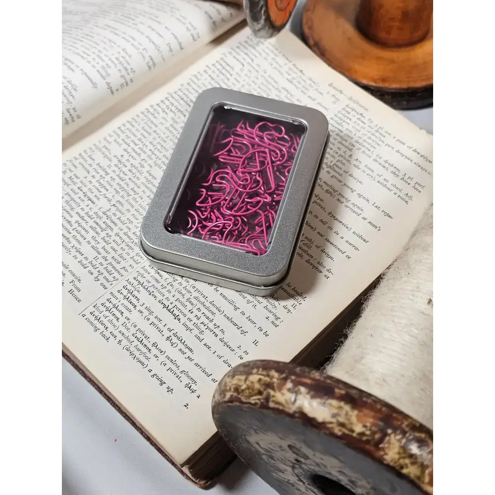 20 Flamingo Paper clips in a tin. - paper clips