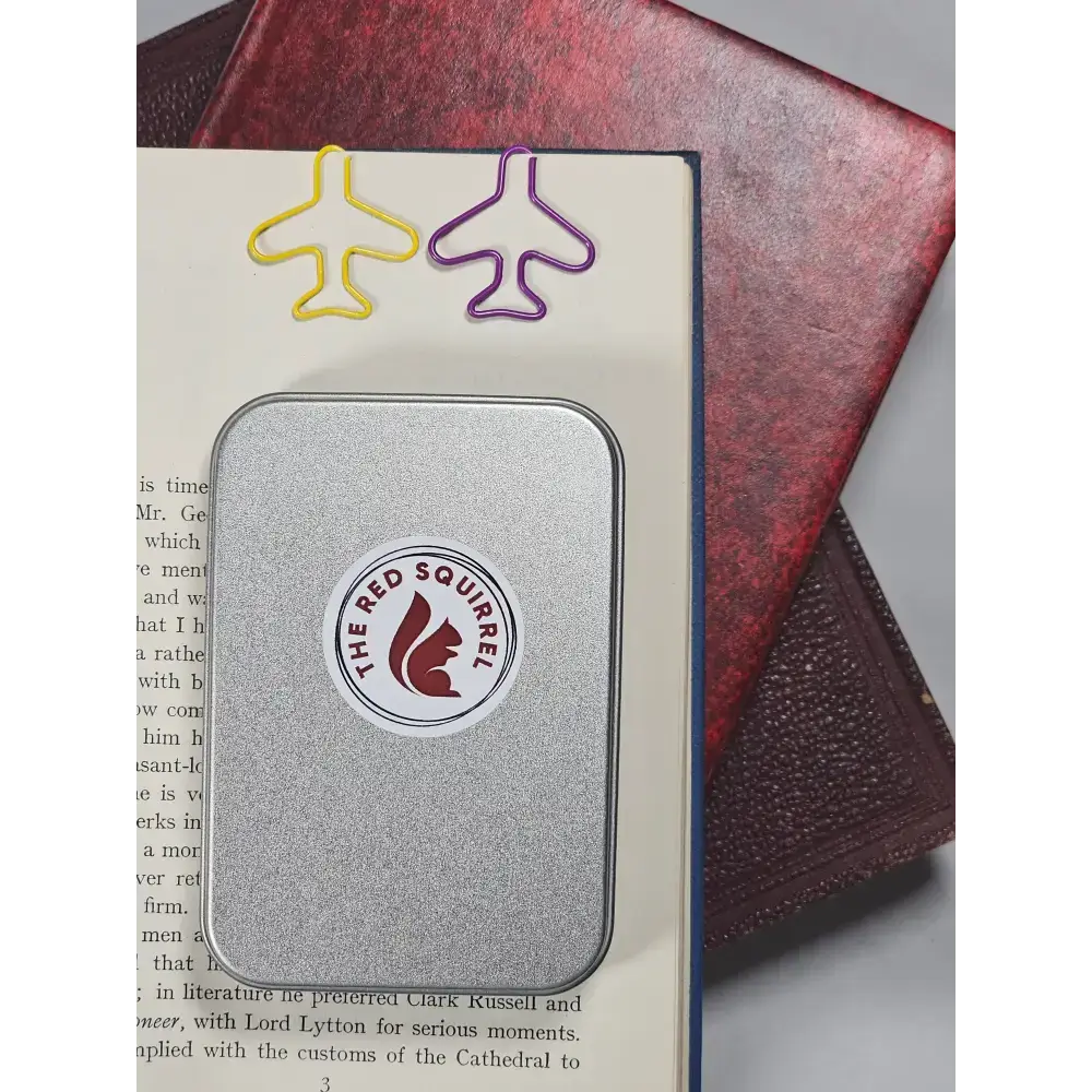 20 Paper clips in a tin. - paper clips