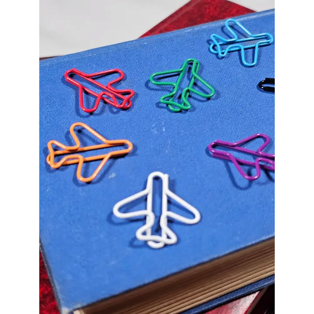 20 Paper clips in a tin. - paper clips