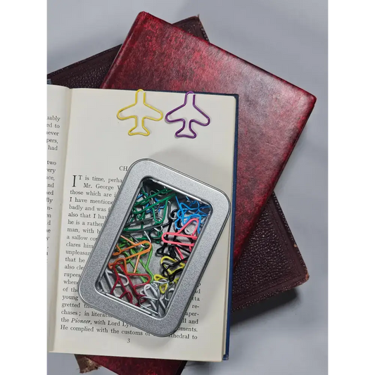 20 Paper clips in a tin. - paper clips