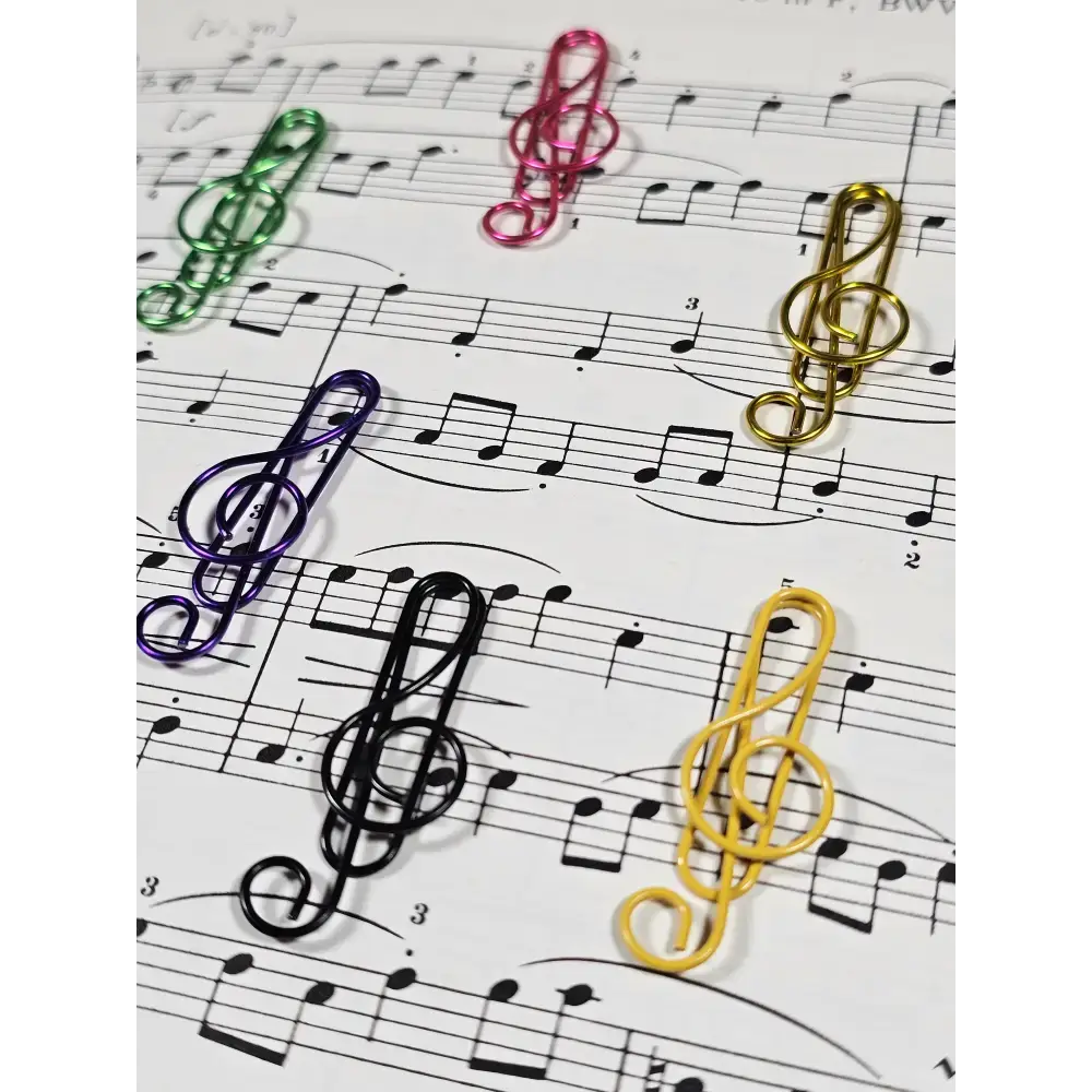 20 Treble Clef Musical note Paper clips in a tin. - paper clips