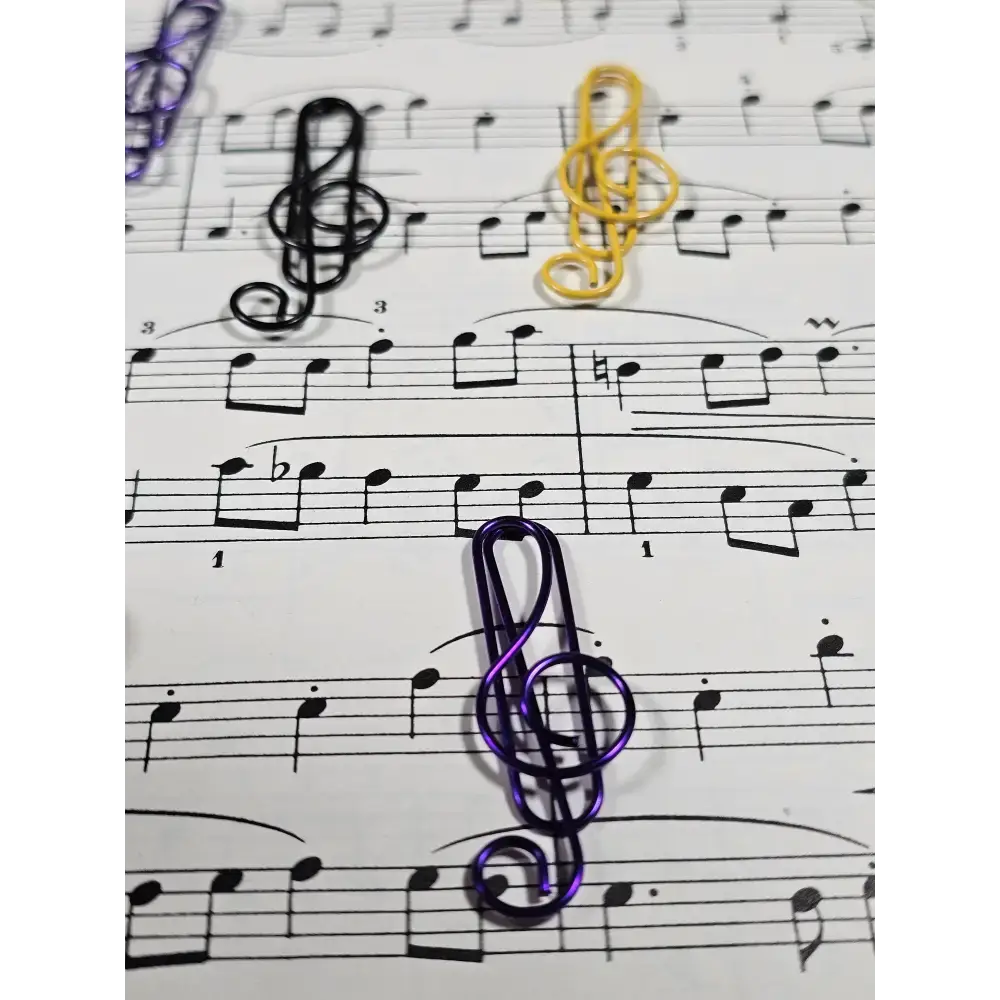20 Treble Clef Musical note Paper clips in a tin. - paper clips
