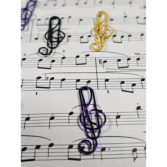 20 Treble Clef Musical note Paper clips in a tin. - paper clips