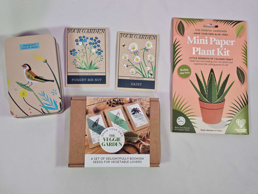 Green Fingered Gift Set featuring mini plant kit, flower seed packets, and gardening tools for plant lovers.