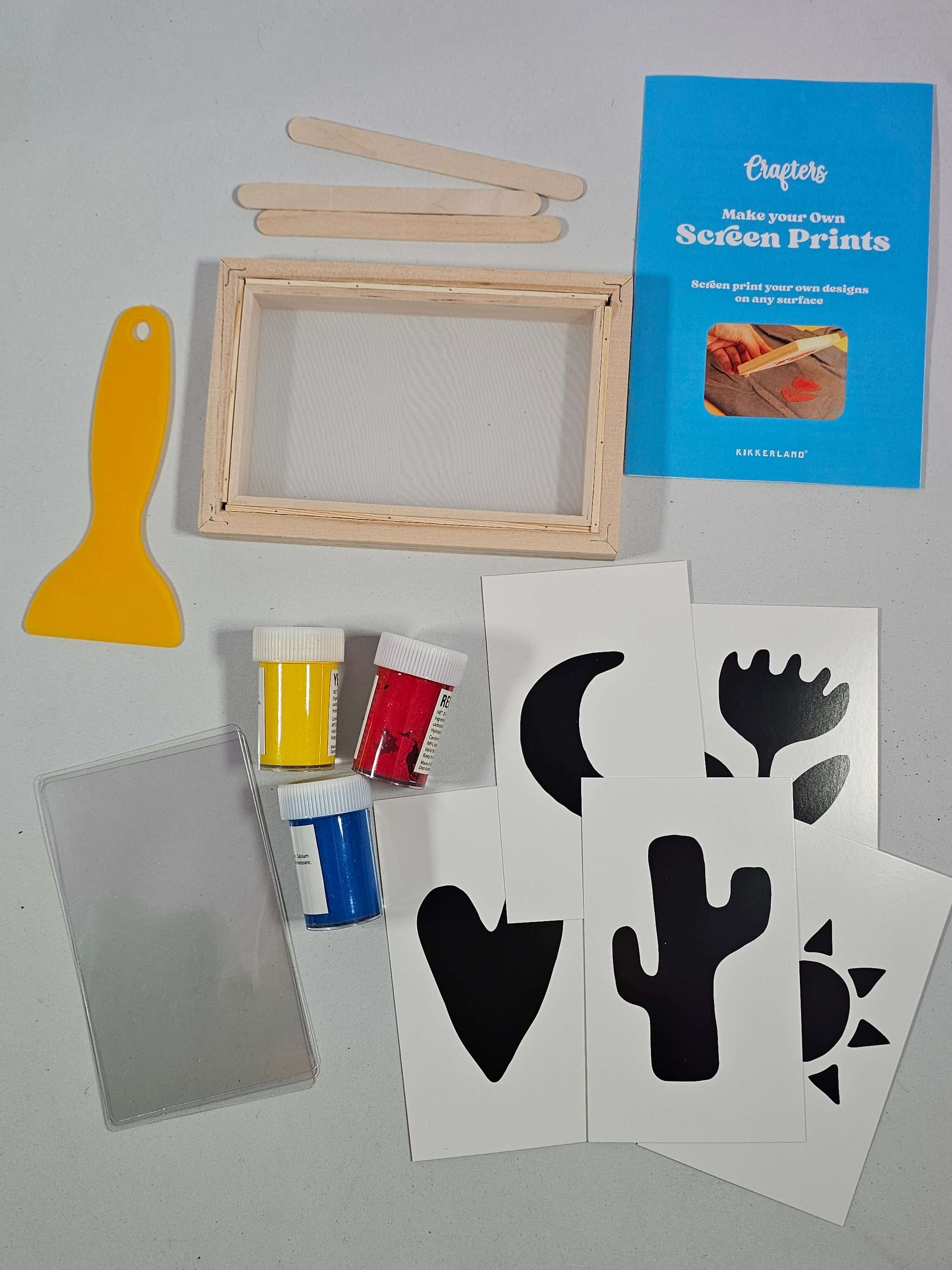 Make your own screen print kit with wooden frame, stencils, acrylic paints, squeegee, and instructions.