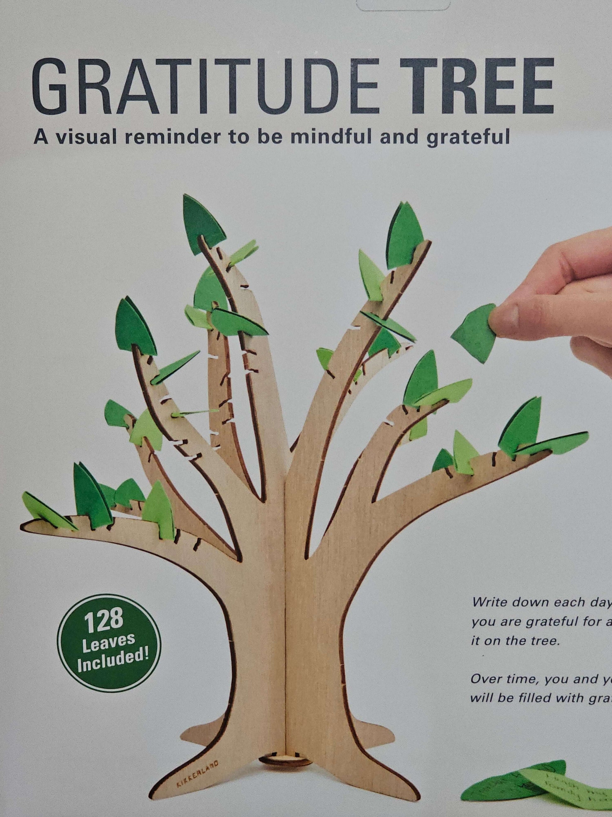 Gratitude Tree by Kikkerland, featuring 128 leaves for daily expressions of gratitude, made from Platane wood and paper.