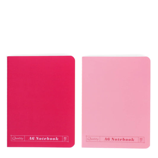 Two pink notebooks with 'Quality A6 Notebook' text on a white background
