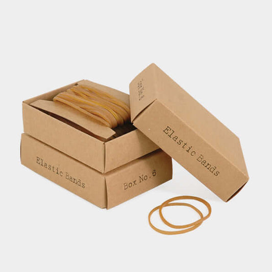 Brown cardboard box with elastic bands on a white background