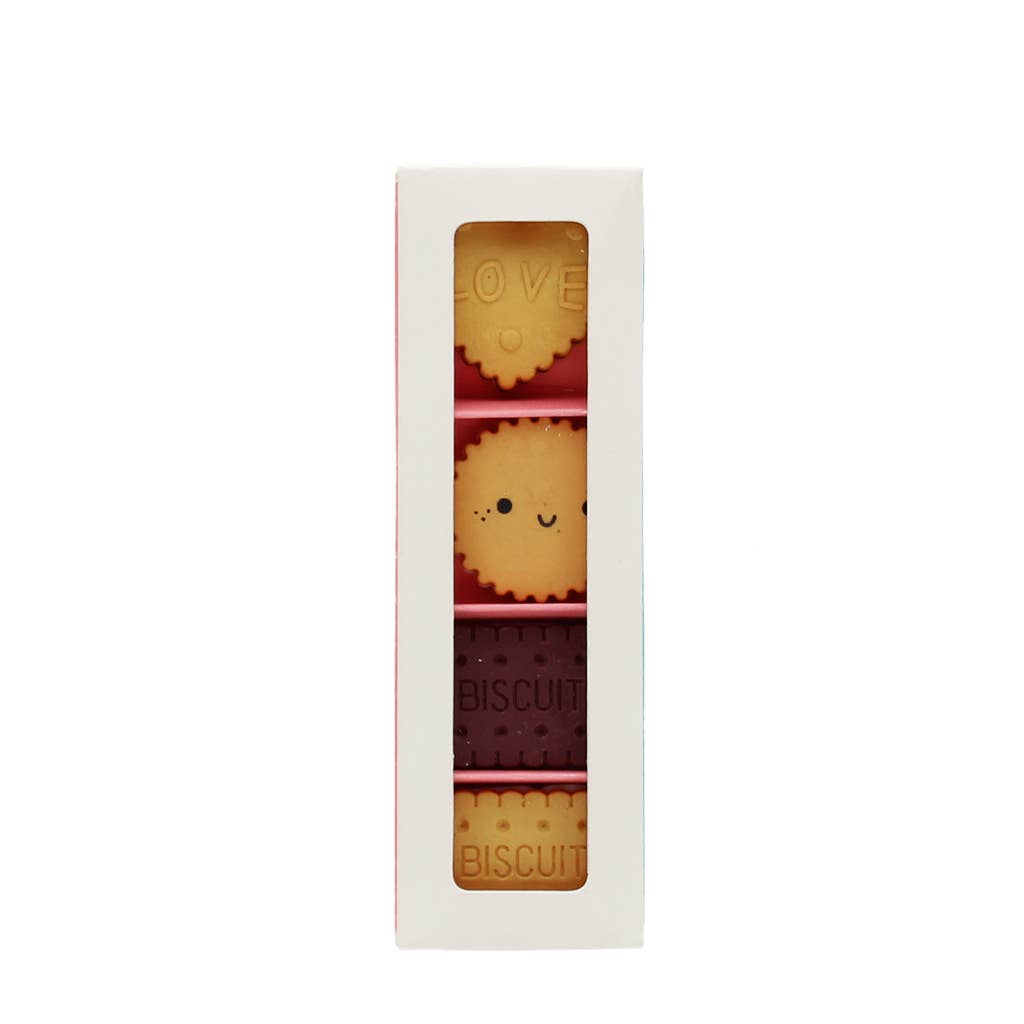 Set of three chocolate bars with cute designs in a white box on a white background