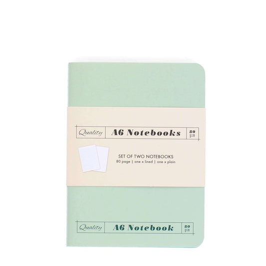 Set of two A6 notebooks with a green and beige design on a white background