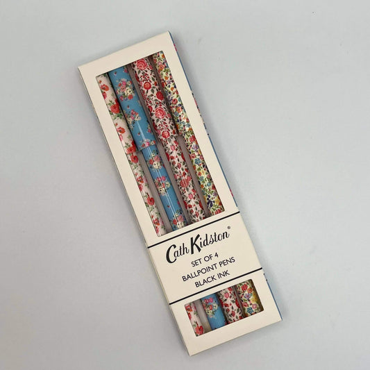 Set of 4 floral-patterned ballpoint pens in packaging with 'Cath Kidston' branding on a gray background.