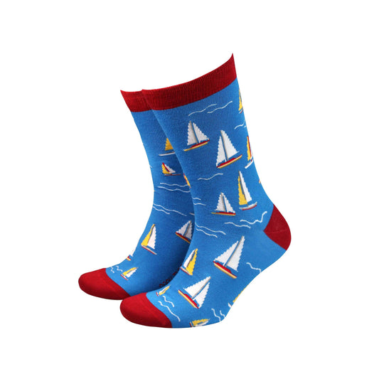 Bright blue men's bamboo socks featuring colorful sailboat patterns for a fun and comfortable sock experience.