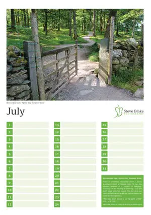 Calendar page for July with a scenic landscape of a wooden gate and path in a forest.