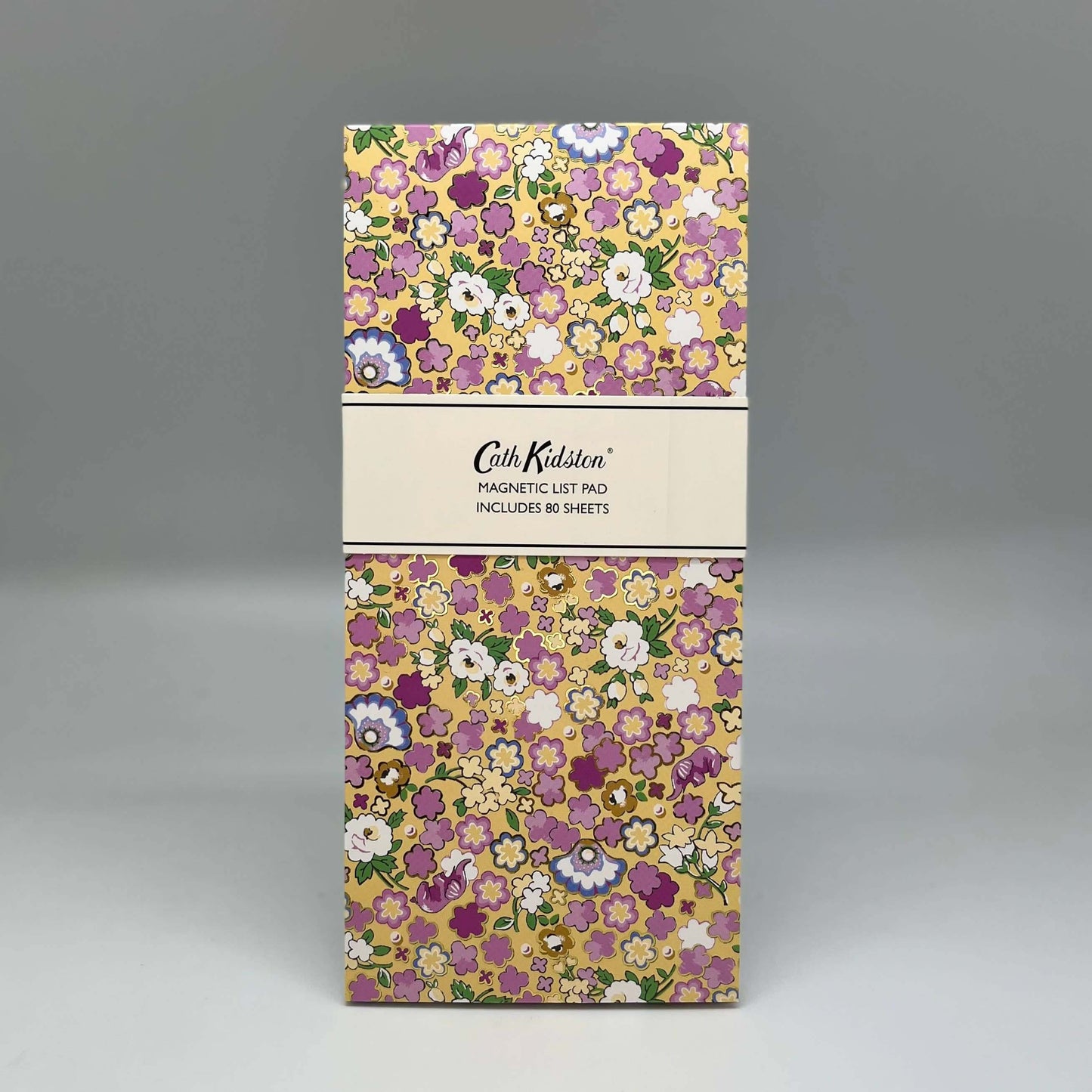 Floral patterned product packaging with 'Cath Kidston' branding on a gray background