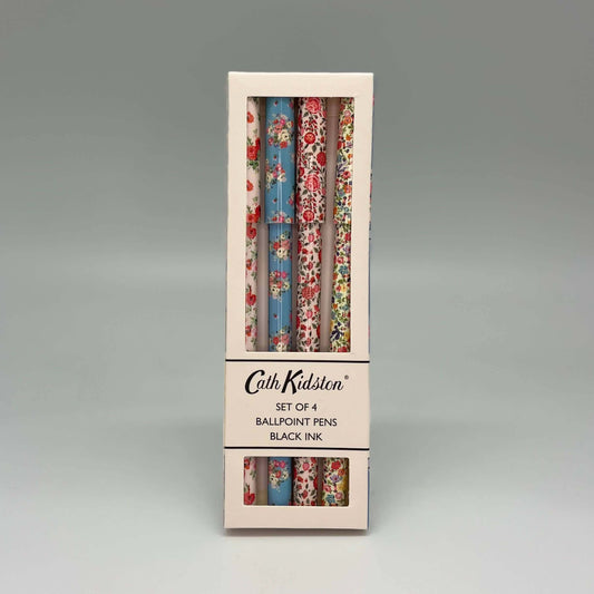 Set of 4 ballpoint pens in floral packaging with Cath Kidston branding on a gray background