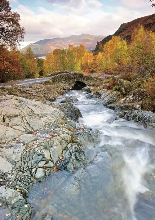 Steve Blake Photography Greetings Cards featuring a scenic view of a river and bridge in the picturesque Lake District.