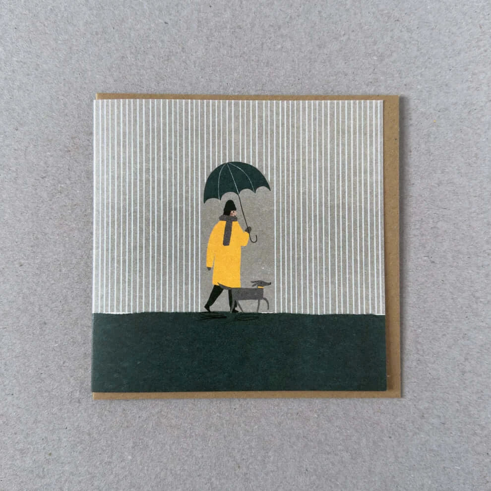 Greeting card with a person in a yellow raincoat holding an umbrella on a striped background