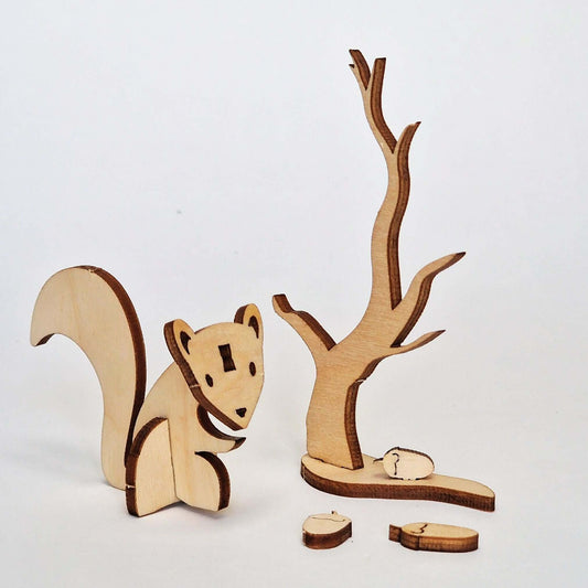 Wooden model animal kit featuring a squirrel and tree, perfect for creative building and decorating activities.