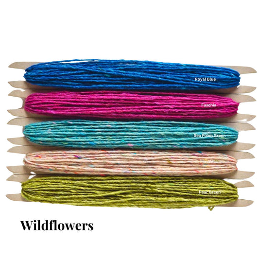 Five-pack of Donegal weaving yarn in vibrant colors: Royal Blue, Fuchsia, Sea Foam Green, Petal Pink, and Pat Green.