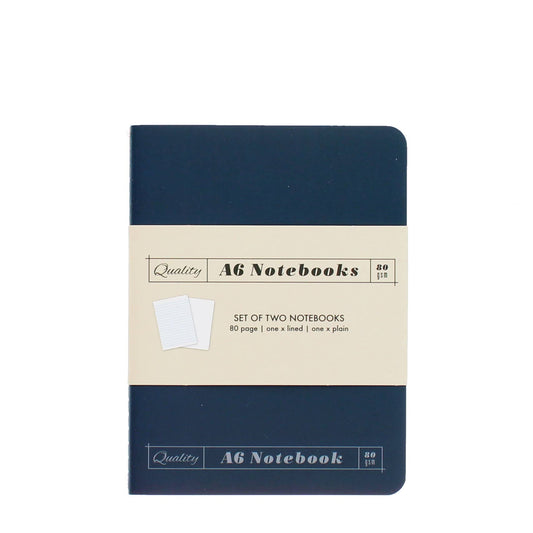 Set of two A6 notebooks with navy blue covers on a white background