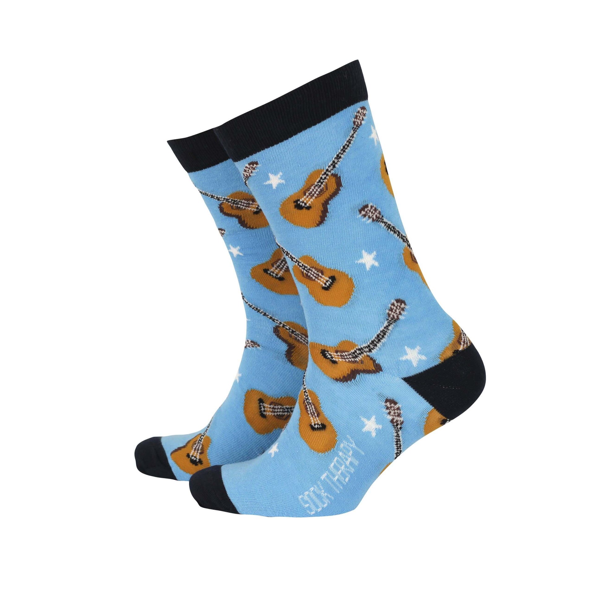 Men's bamboo socks featuring acoustic guitars and a blue background, combining comfort and funky style.