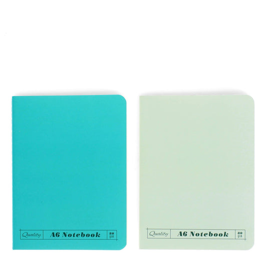 Two notebooks, one turquoise and one light green, on a white background.