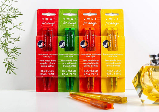 Recycled Make a Mark pen set featuring red, green, orange, and yellow pens made from recycled plastic bottles.