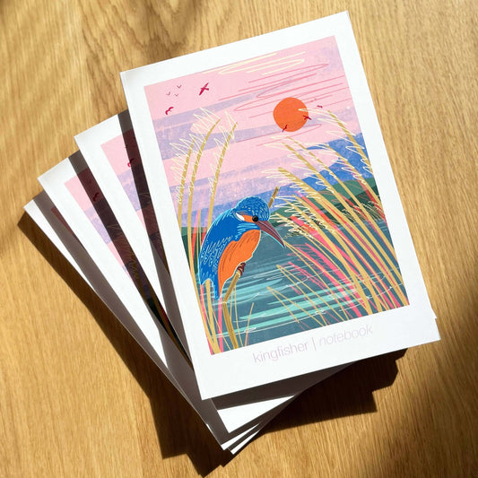 A5 Kingfisher notebook with vibrant cover illustration of a kingfisher by the river, showcasing premium design.