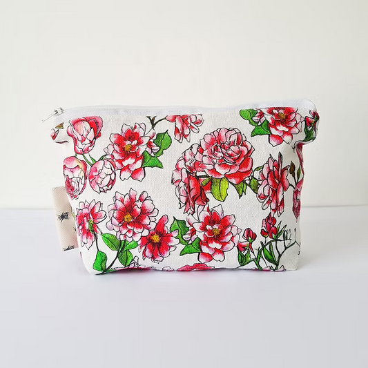 Floral-patterned pouch on a white background