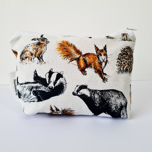 Fabric pouch with animal pattern on a white background
