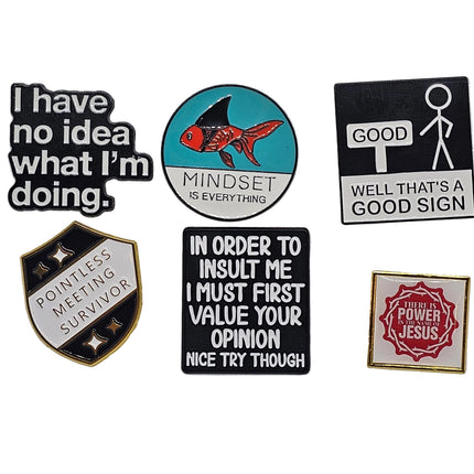 Pin badges with words on - The Red Squirrel