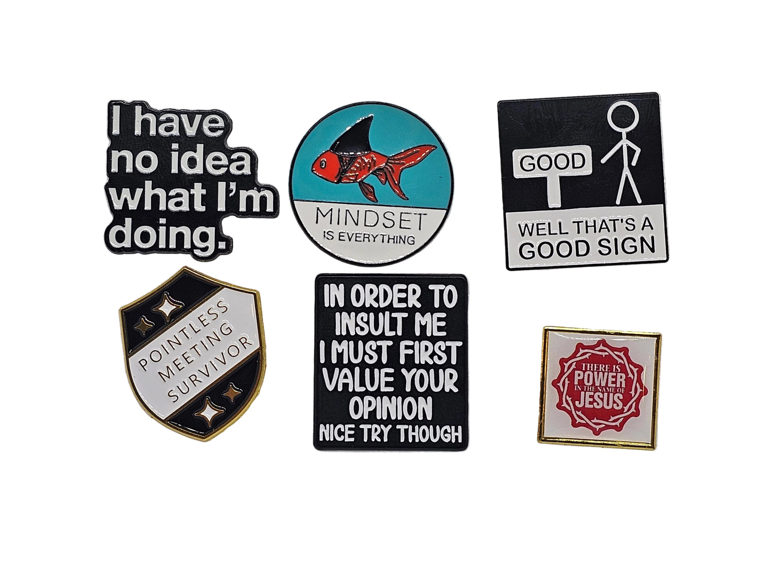 Pin badges with words on - The Red Squirrel