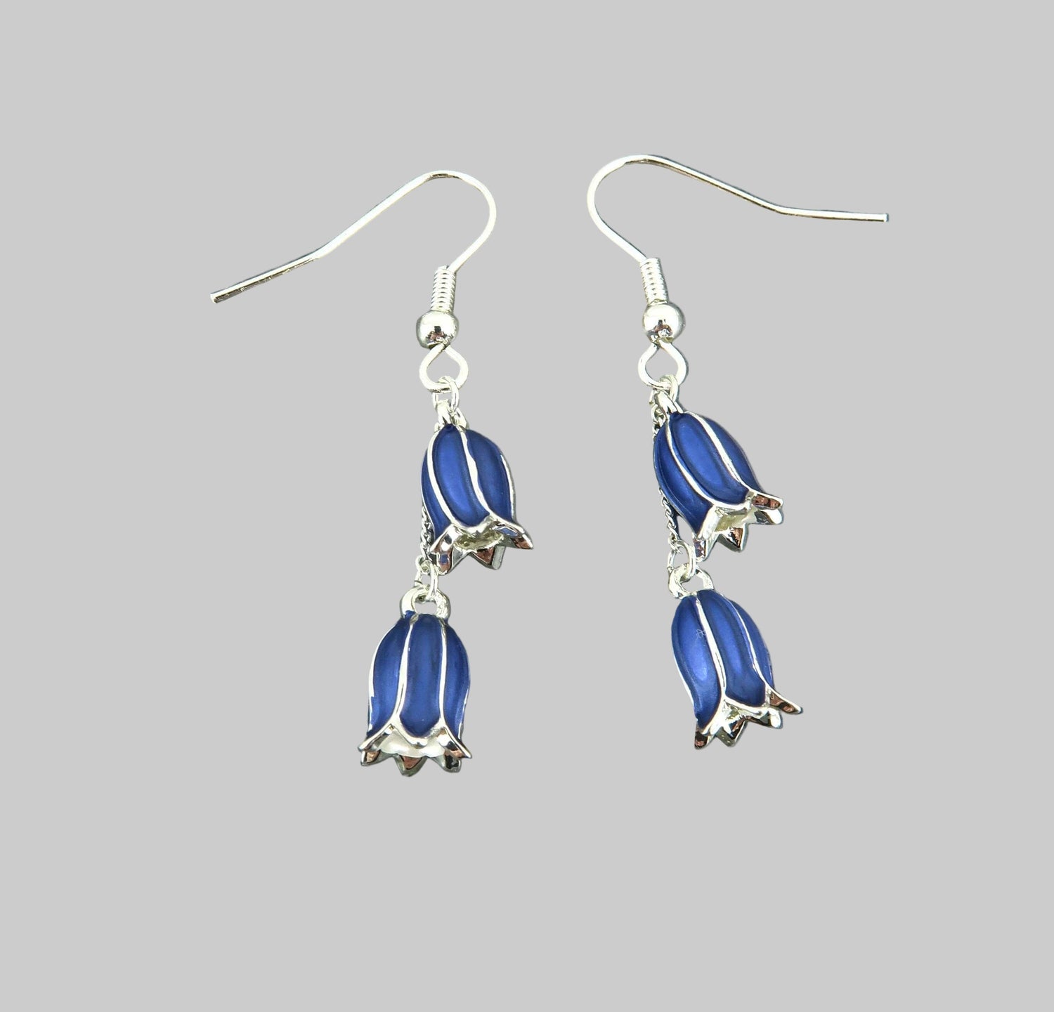 Elegant purple floral earrings, crafted with fine silver, perfect for adding charm to any jewellery collection.