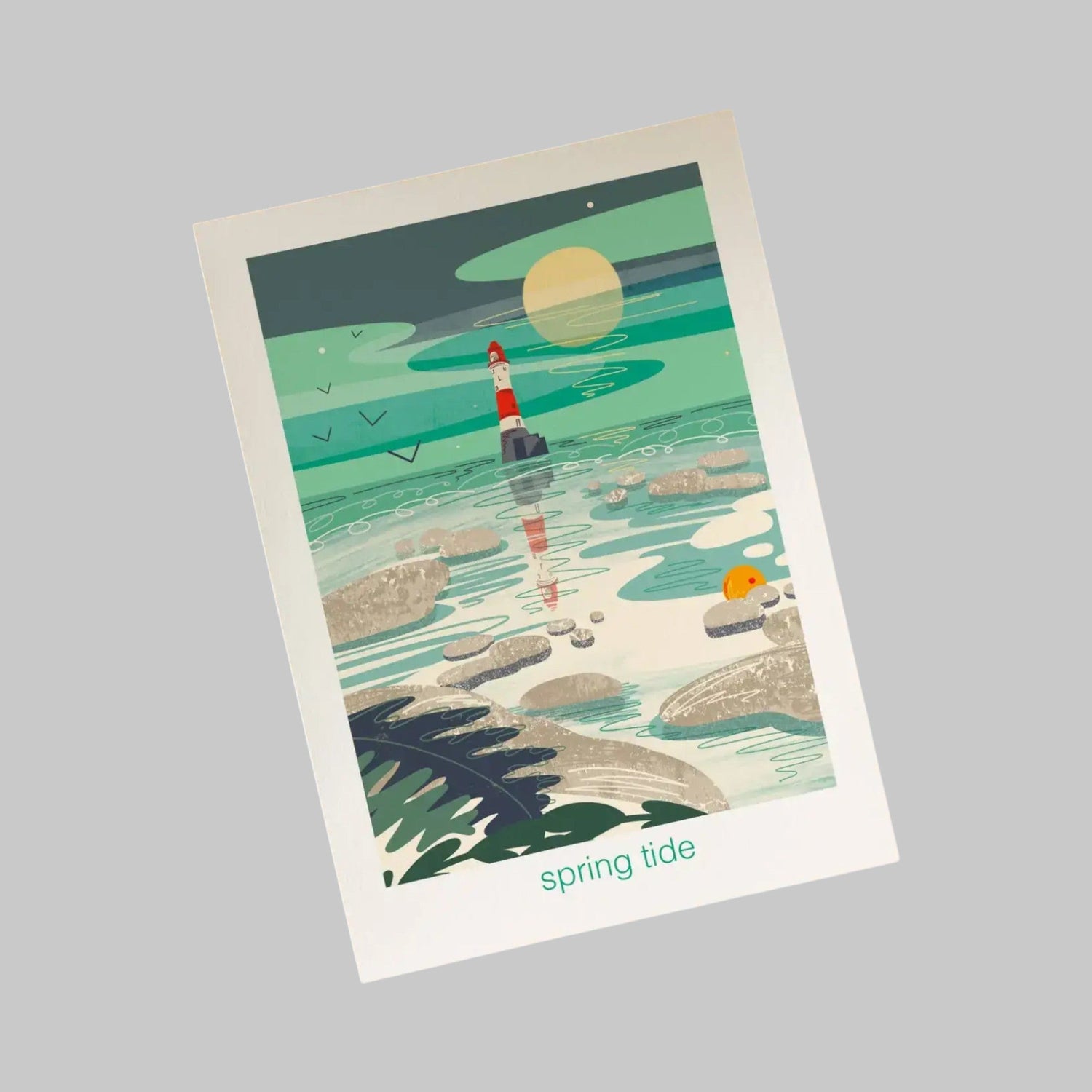 Colorful greetings card featuring a lighthouse by the sea, titled 'spring tide', ideal for sending warm wishes.