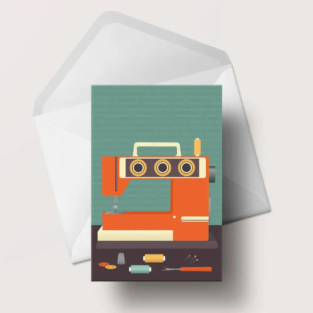 Retro sewing machine illustration on a greetings card, showcasing vintage design elements and crafting tools.