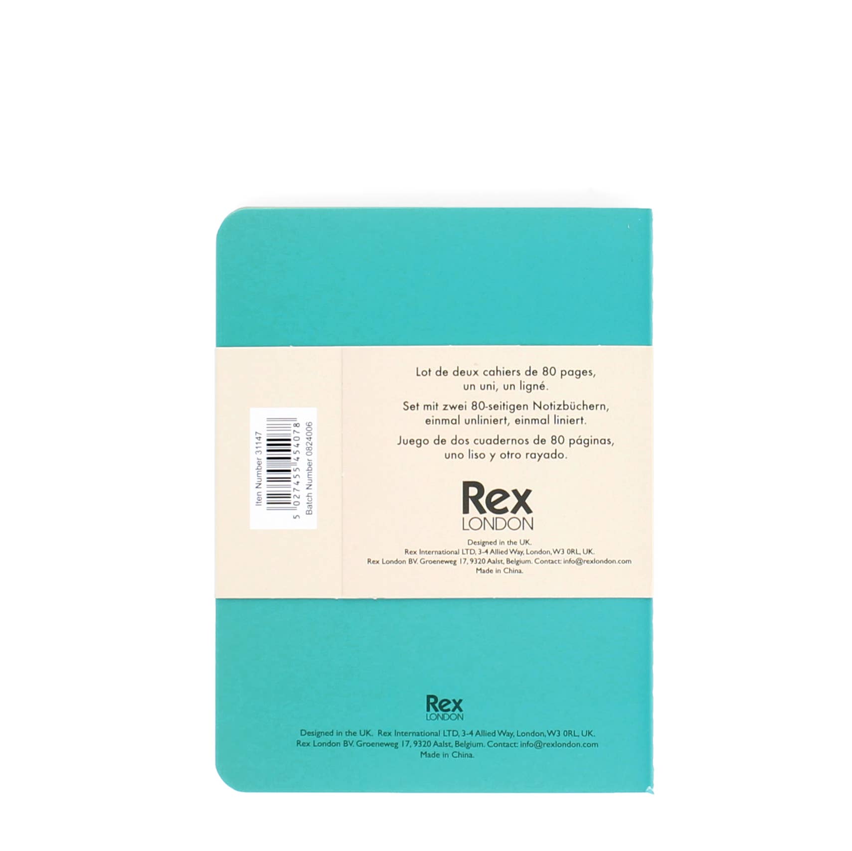 Teal notebook with beige label on a white background