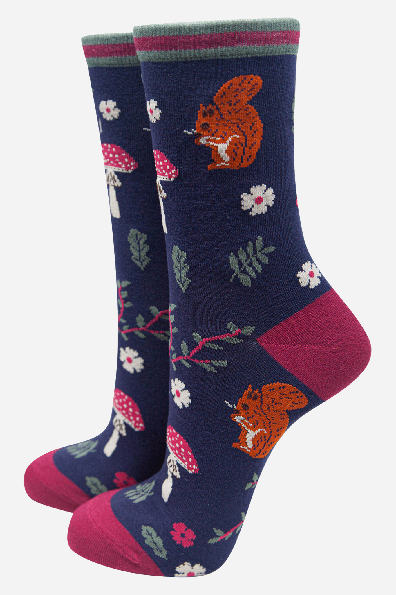 Pair of socks with squirrel and flower design on a blue background