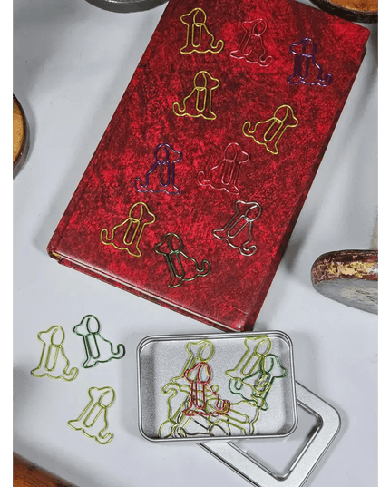 20 Dog Paper clips in a tin.