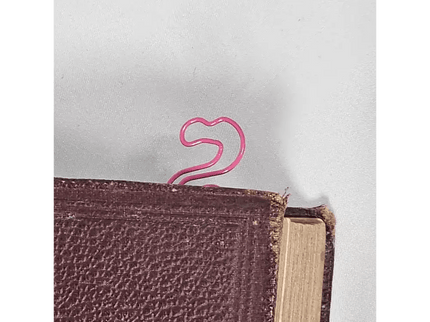 20 Flamingo Paper clips in a tin.