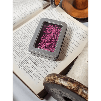 20 Flamingo Paper clips in a tin.