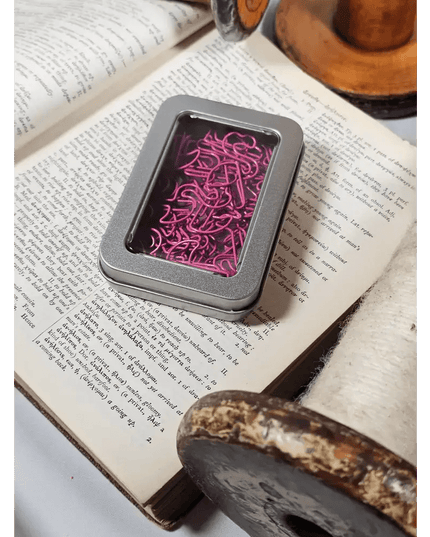 20 Flamingo Paper clips in a tin.