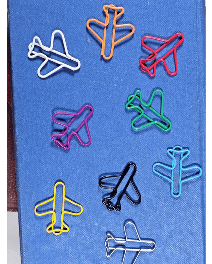 20 airplane shaped paper clips in a tin.
