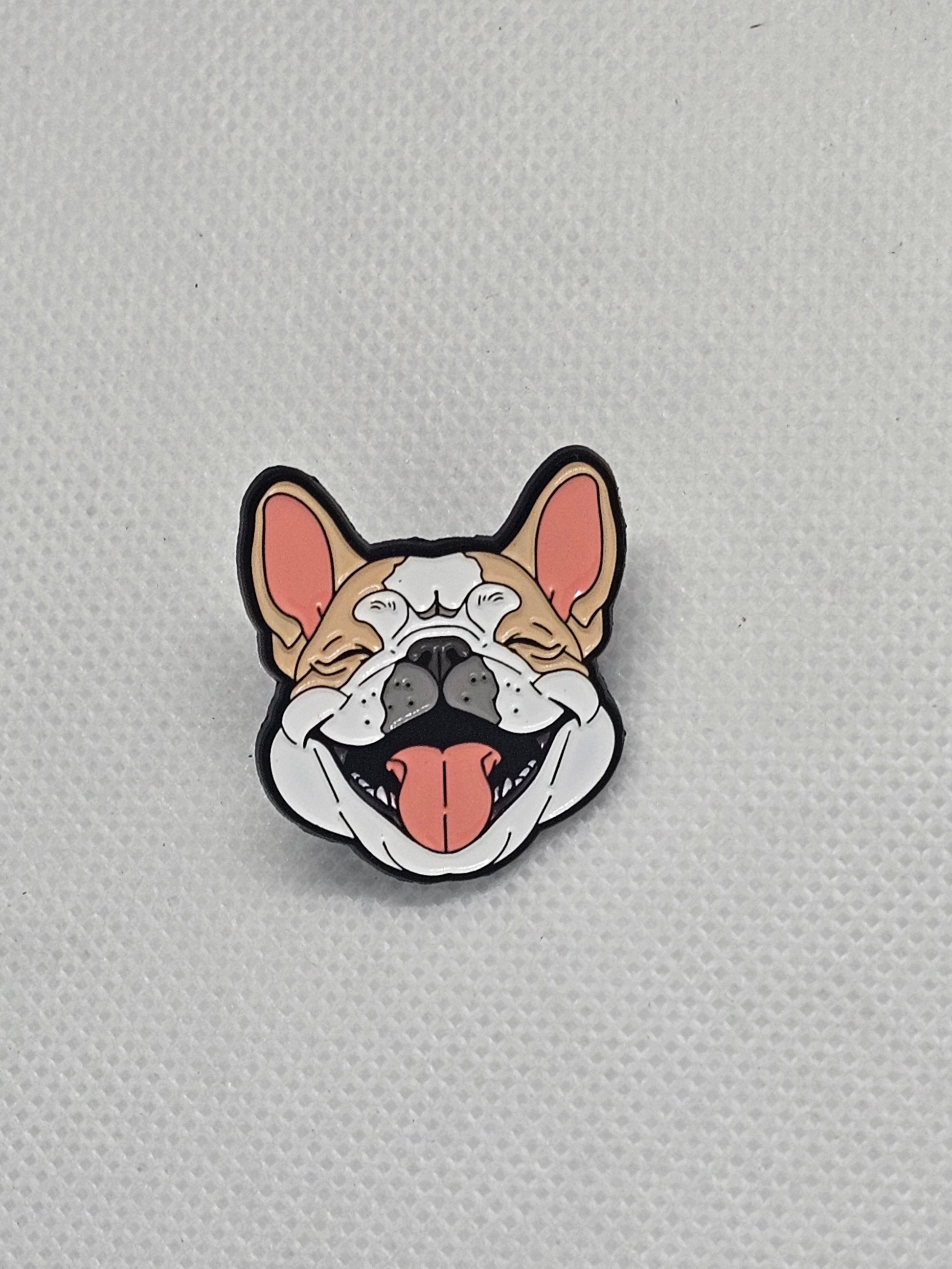 Smiling French Bulldog enamel pin badge, perfect for dog lovers to accessorize clothing and bags.