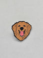 Golden retriever enamel pin badge, perfect for dog lovers to accessorize clothing and bags.