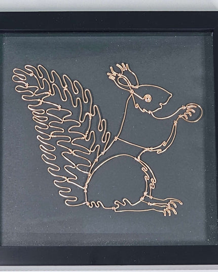 A Framed handmade wire Squirrel