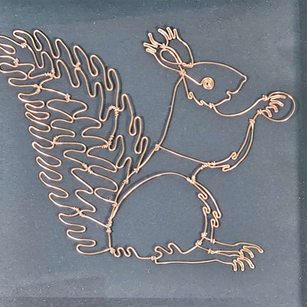 A Framed handmade wire Squirrel