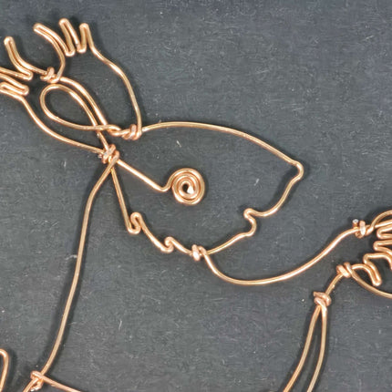 A Framed handmade wire Squirrel