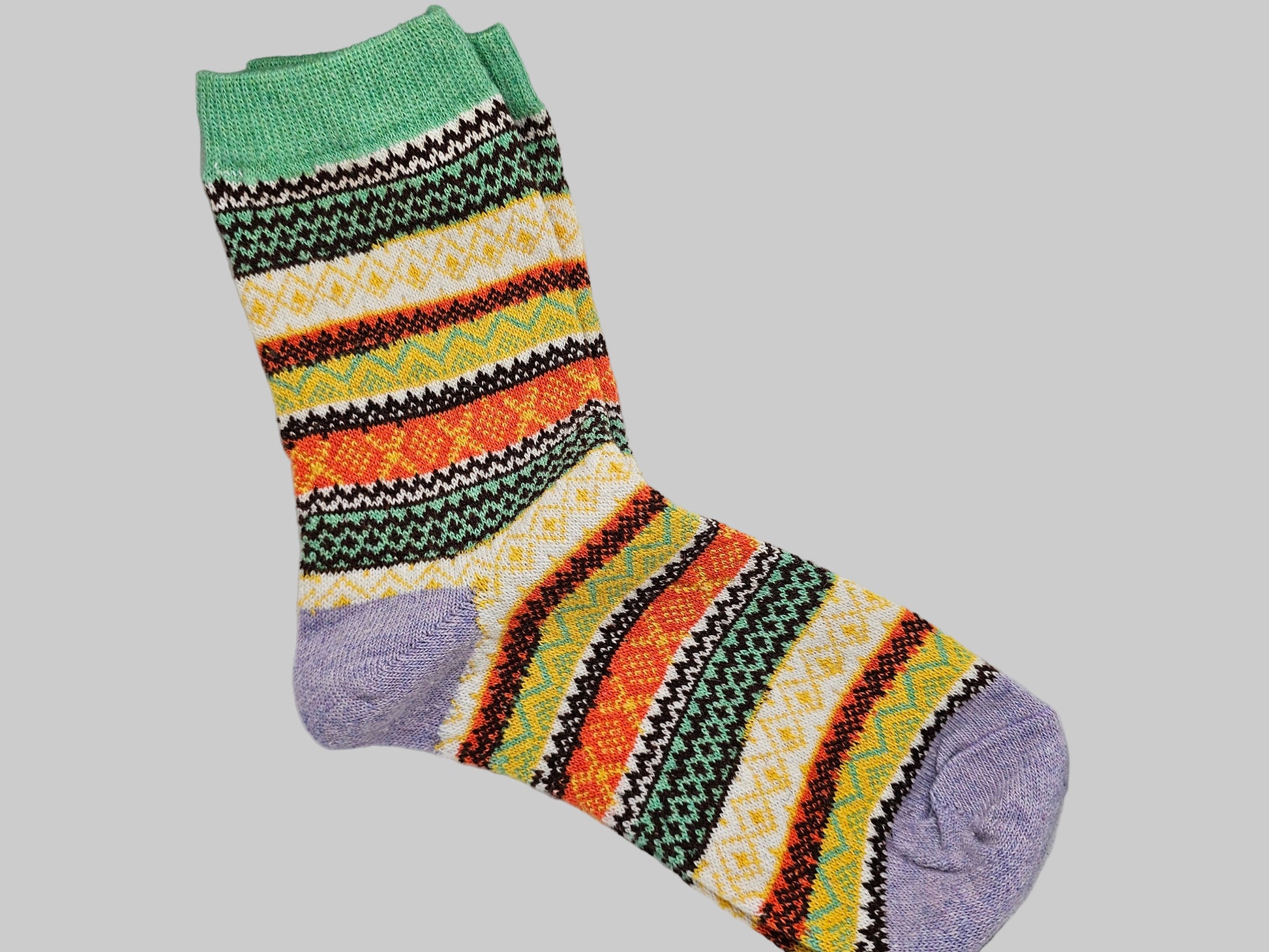 Colorful patterned sock on a white background